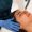 Getting photo rejuvenation procedure at cosmetology clinic. Woman is getting LPG hardware massage in beauty salon.